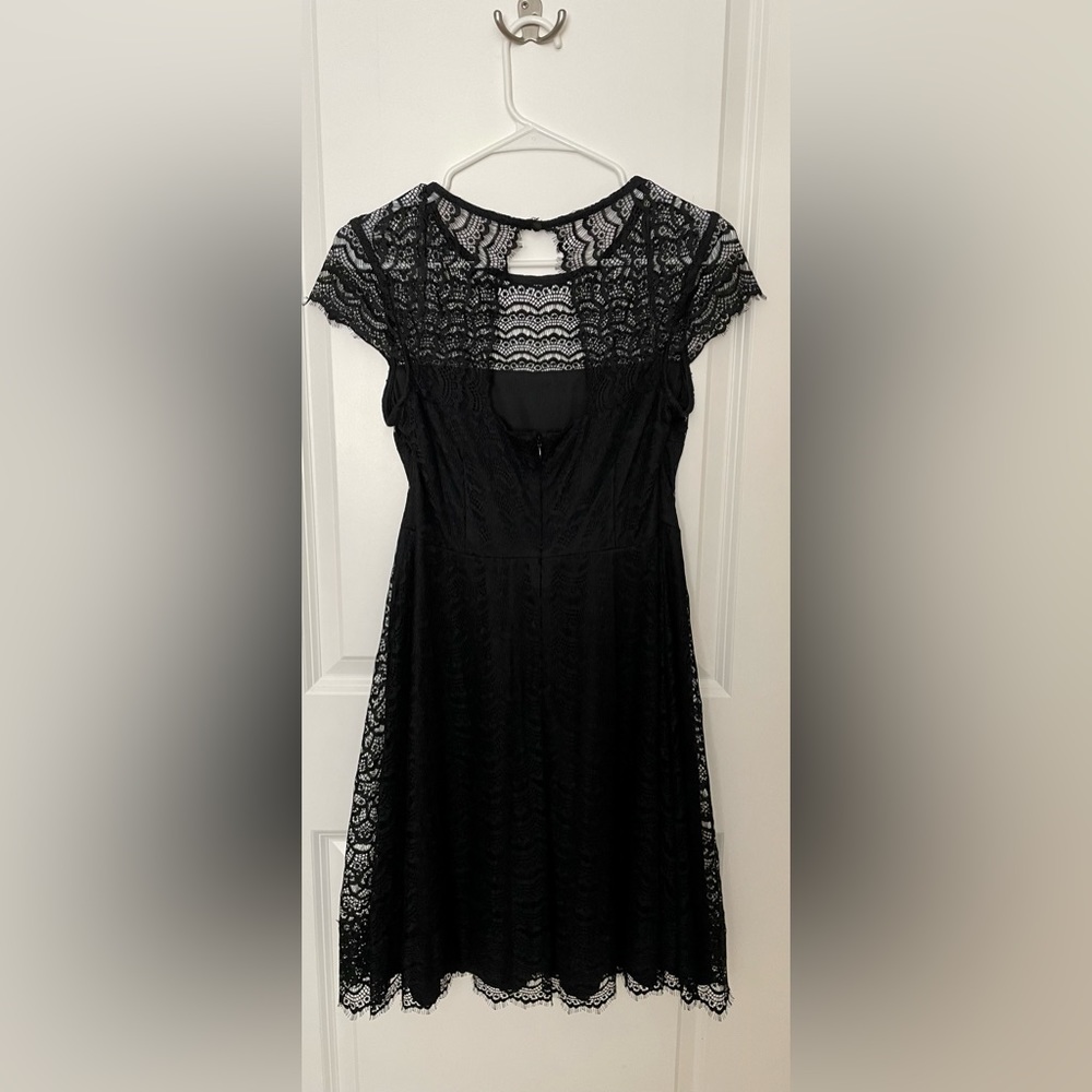 Black cocktail dress with lace overlay